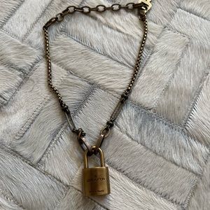 Authentic Louis Vuitton lock one of a kind necklace designed by Mark Edge